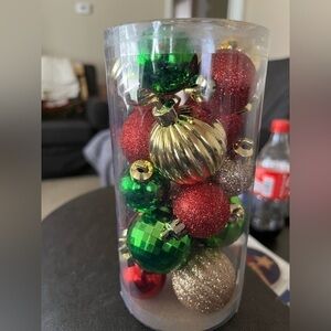 NWOT Holiday Time by Walmart. Canister full of various color and size ornaments.